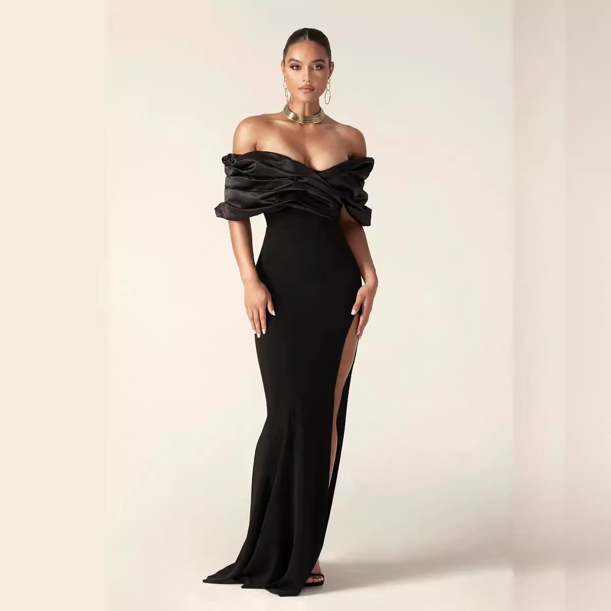 Black pleated edge strapless dress for slimming, tight fitting, and floor length, with a hip hugging design