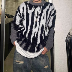 Suéter con fuente de llamas