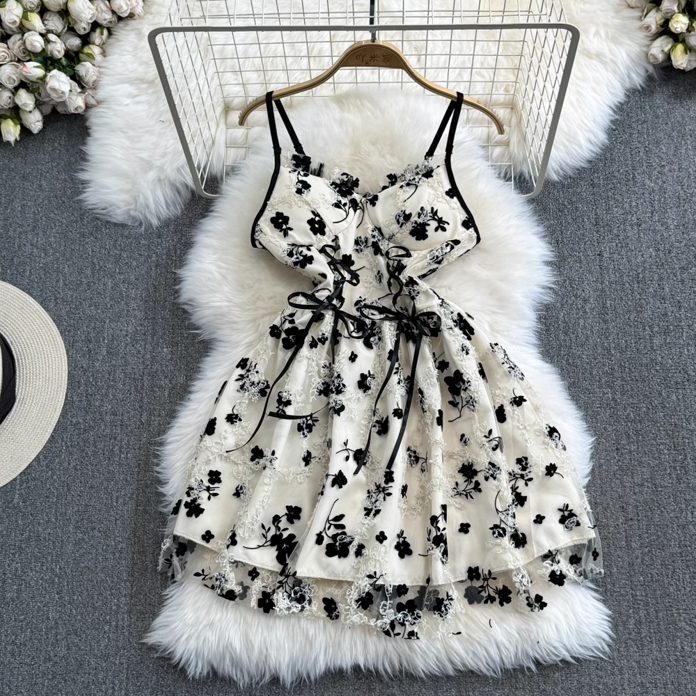 Ärmelloses rückenfreies A-Linien-Kleid mit Blumenmuster