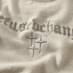 Suéter con bordado de estrellas de High Street