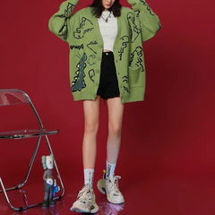 Süße Baby-Drachen-Strickjacke