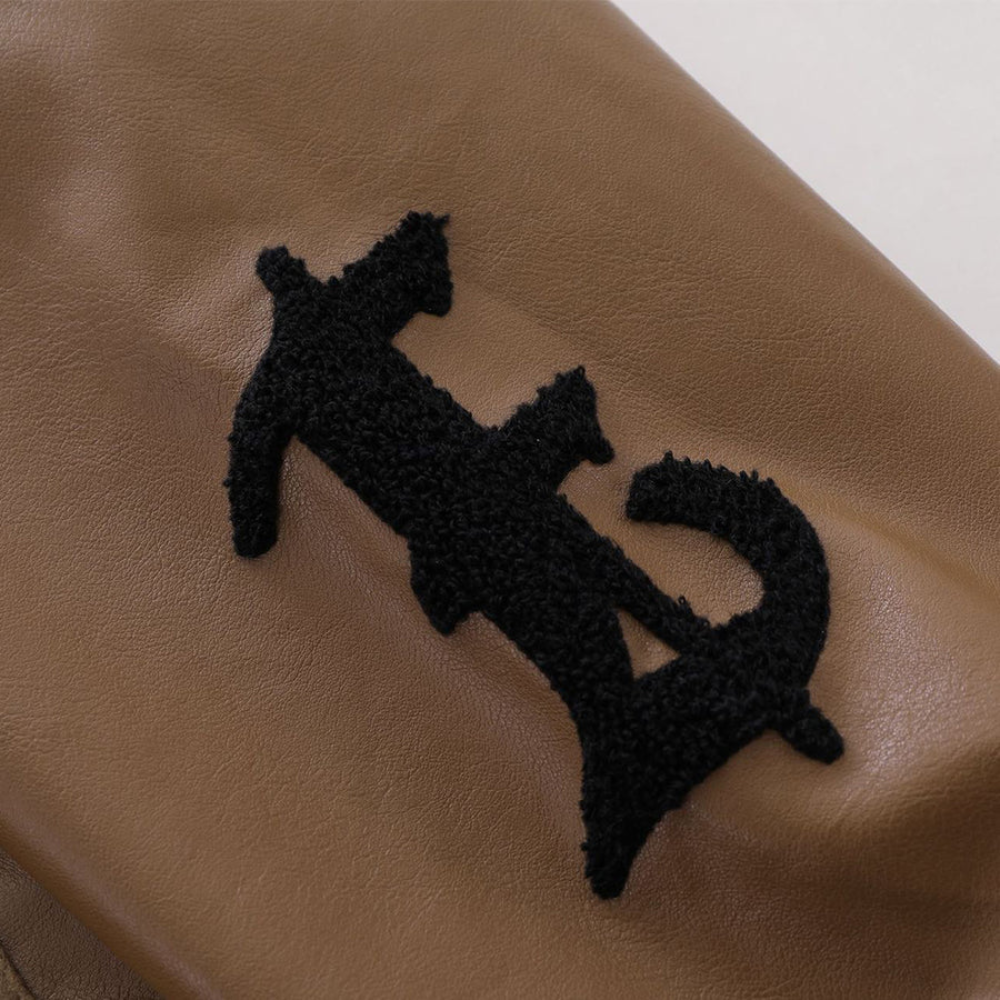 Chaqueta vintage con bordados de cruz
