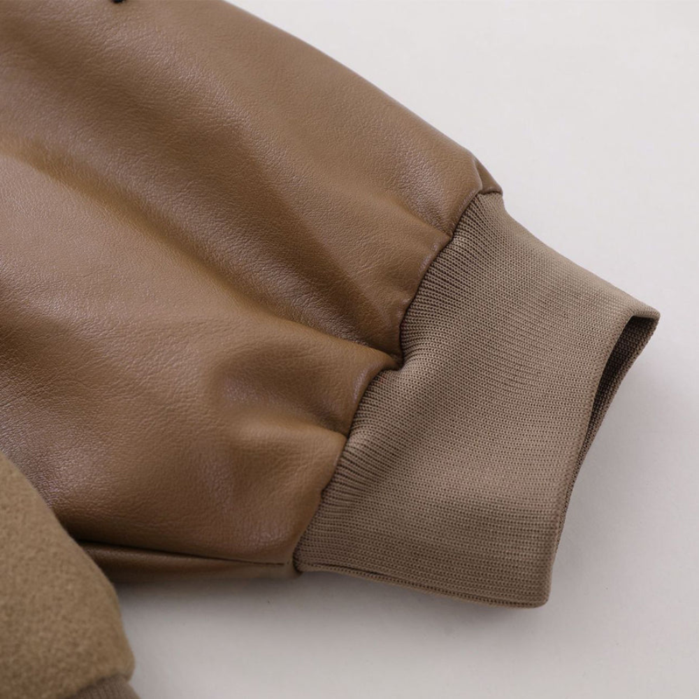 Chaqueta vintage con bordados de cruz