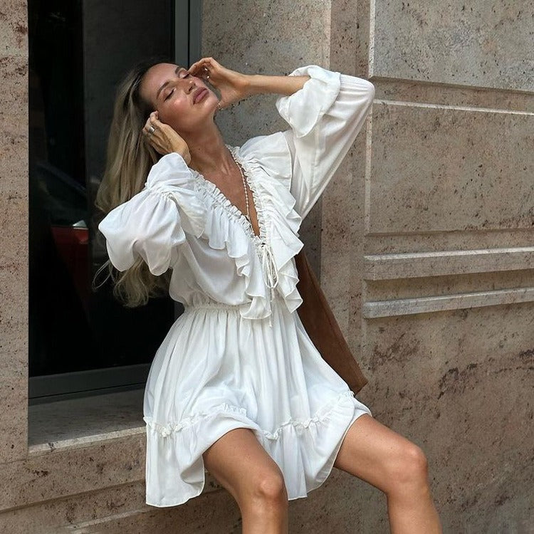 V-neck pleated flared sleeves with ruffled edges, white dress with women's design feeling fluffy skirt