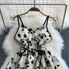 Ärmelloses rückenfreies A-Linien-Kleid mit Blumenmuster