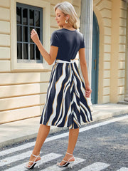 round neck patchwork printed short sleeved dress with large swing