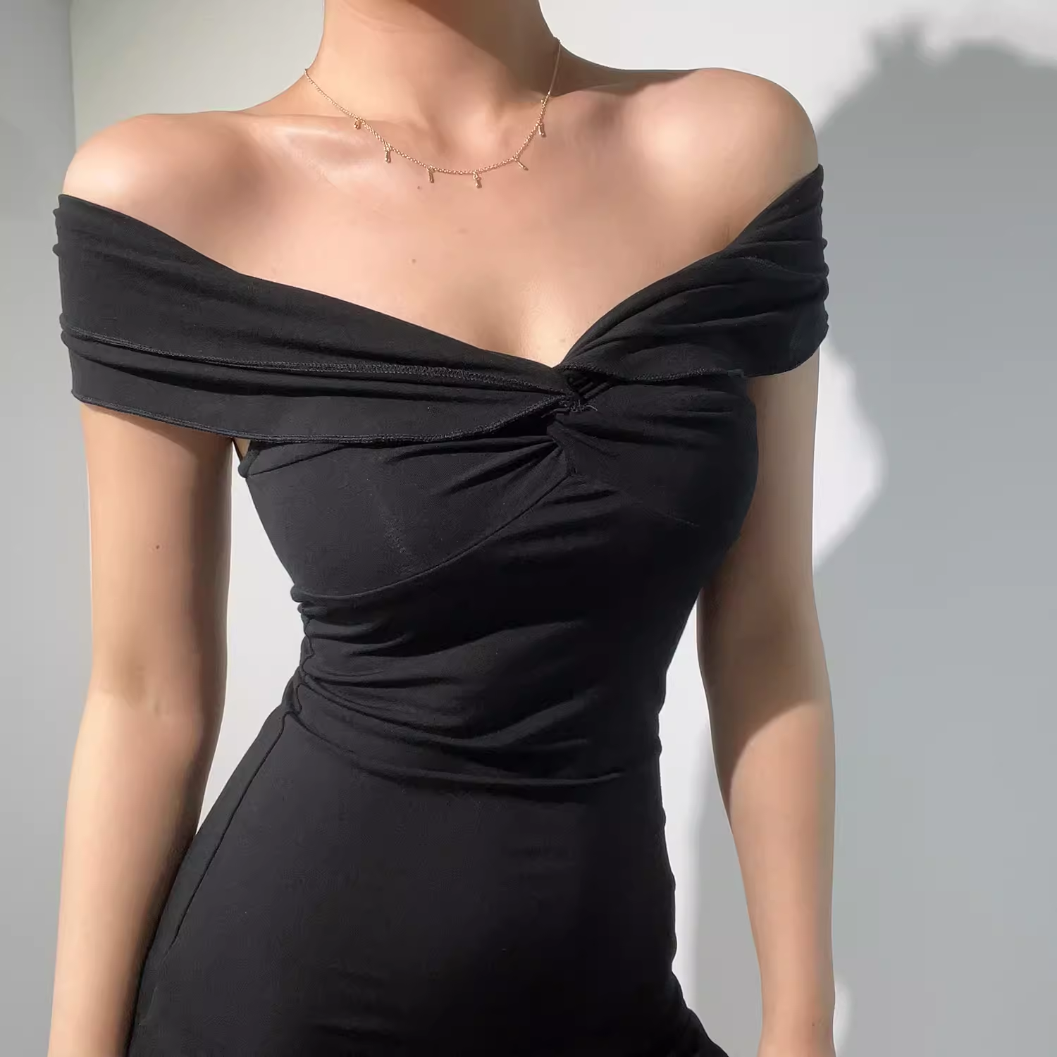 Off the shoulder black dress