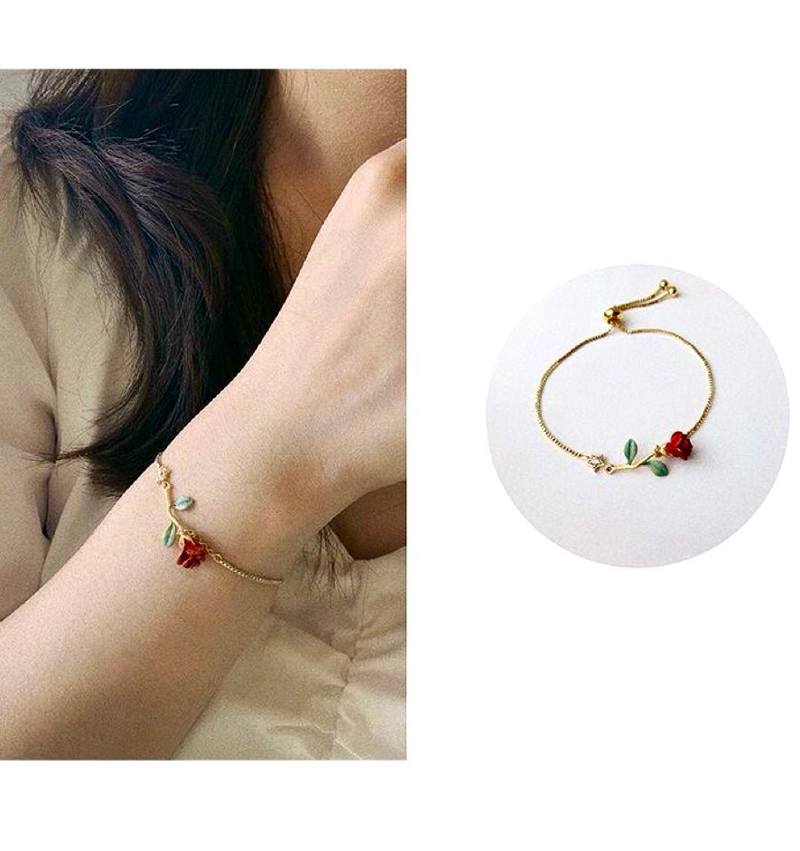 Conjunto de collar y pulsera con rosas rojas románticas