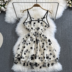 Ärmelloses rückenfreies A-Linien-Kleid mit Blumenmuster