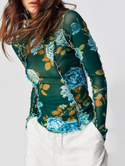 Blusa de manga larga con cuello alto y estampado floral