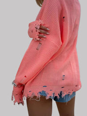 Suéter desgastado de cuello redondo y manga larga