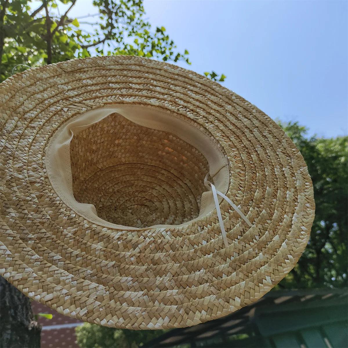 Sombrero de playa de paja con ala ancha y plana