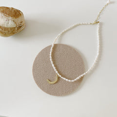 Gold crescent necklace