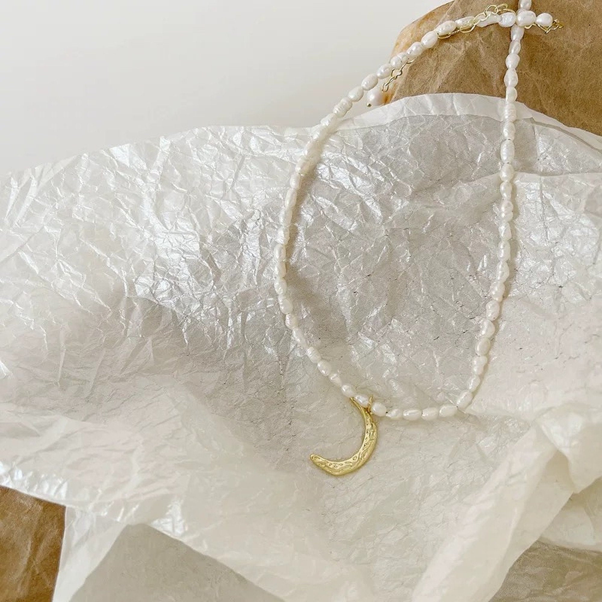 Gold crescent necklace