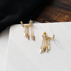 Pendientes de borlas con flecos dorados