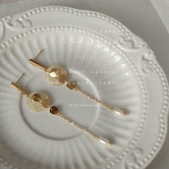 Round dangle tassel earrings