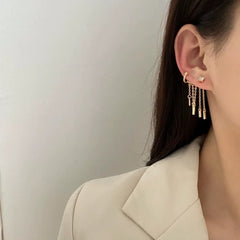 Pendientes de borlas con flecos dorados