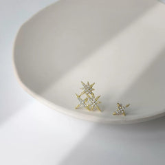 Ungleichmäßiger Nordstern-Ohrstecker