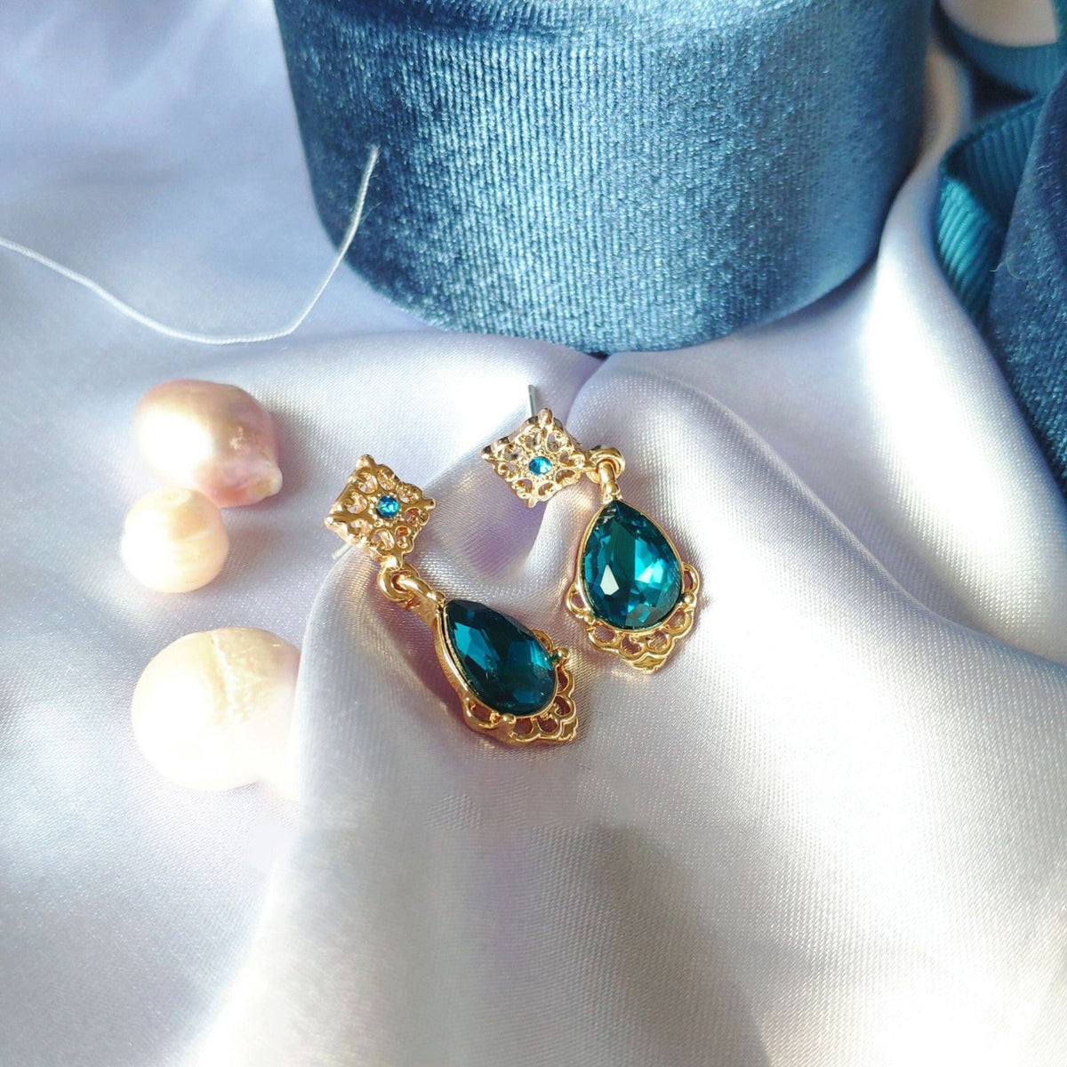 Teardrop blue sapphire earrings