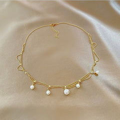 Multi layer gold pearl necklace