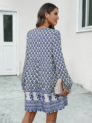 Ladies long sleeve tie-strap A-line dress with positioning print