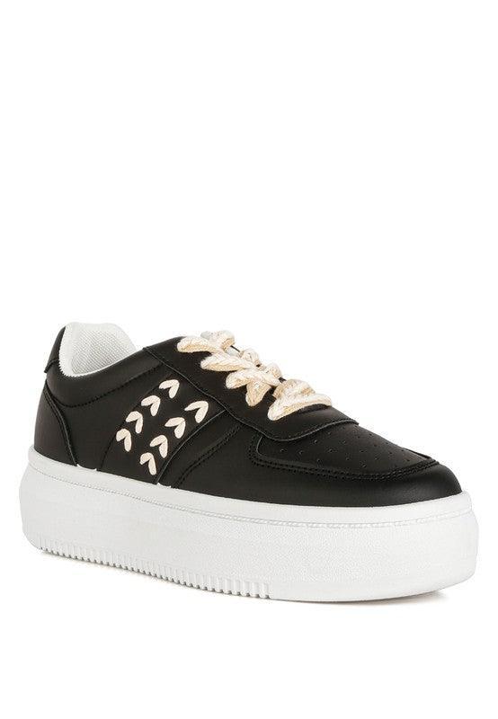 Zapatillas Monigue de piel sintética con detalle de punto de cruz