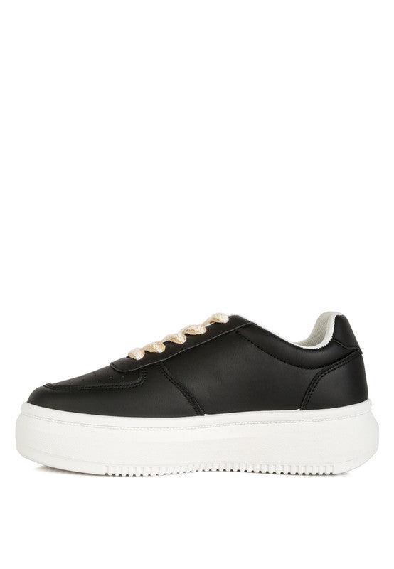 Zapatillas Monigue de piel sintética con detalle de punto de cruz