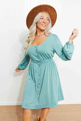 Vestido mini de manga larga con escote redondo y talle imperio