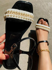 Sandalias planas con cadena de perlas