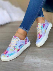 Lässige flache Sneakers mit Pflanzen-Print