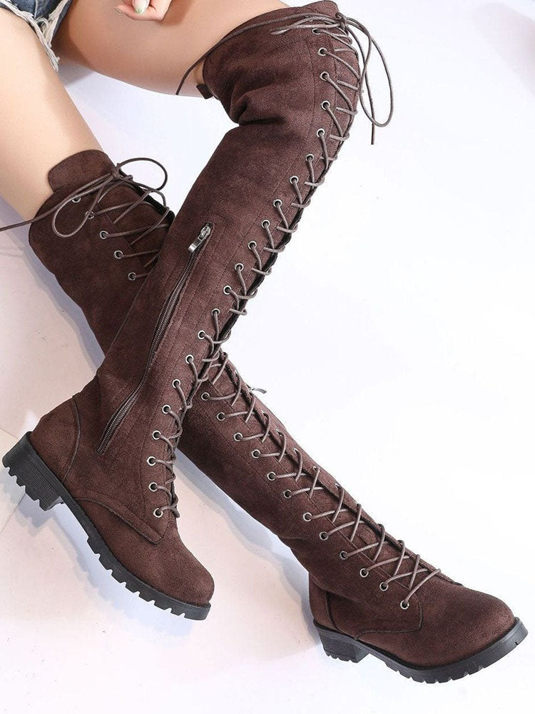 Botas planas de ante con cordones