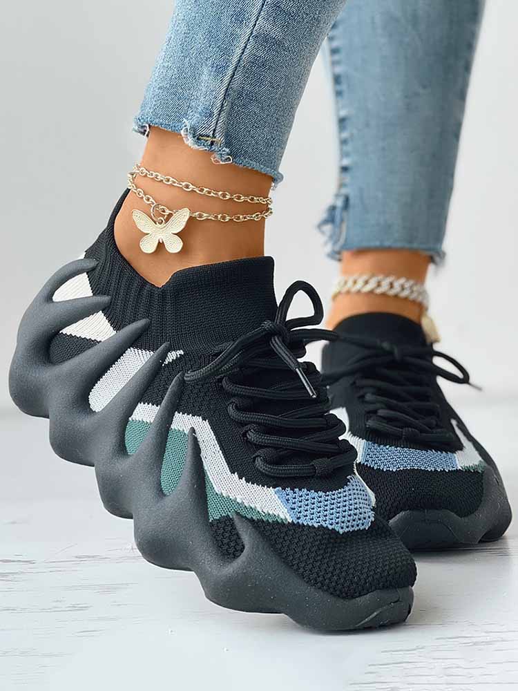 Zapatillas deportivas transpirables de punto con cordones