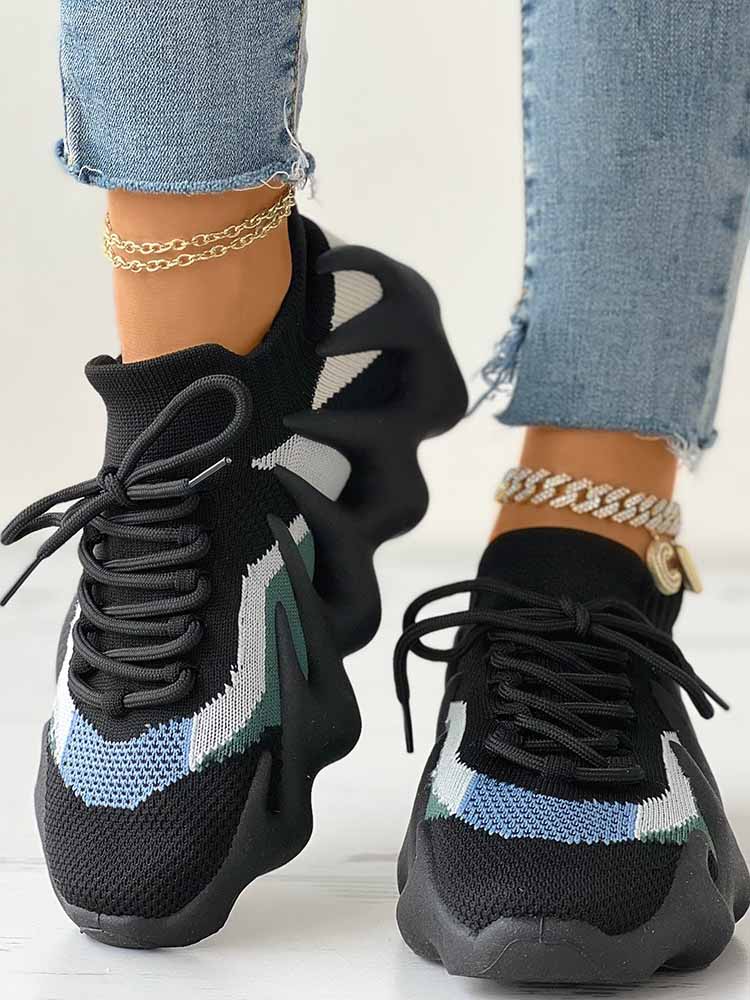 Zapatillas deportivas transpirables de punto con cordones