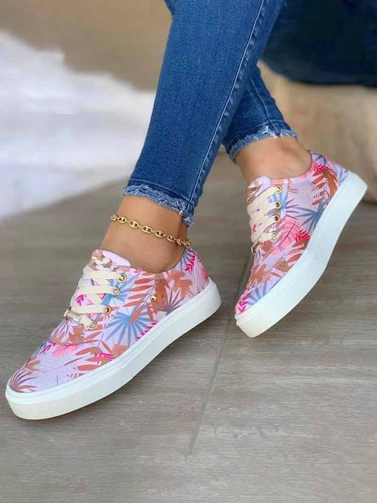 Lässige flache Sneakers mit Pflanzen-Print