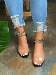 Sandalias planas transparentes con cadena