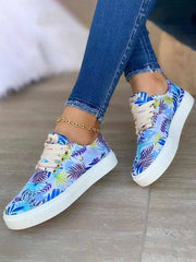 Lässige flache Sneakers mit Pflanzen-Print