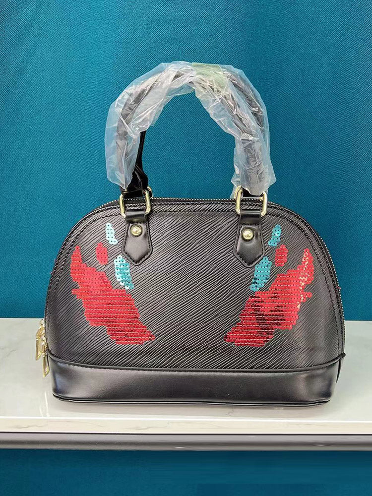 Bolso de mano con decoración de lentejuelas