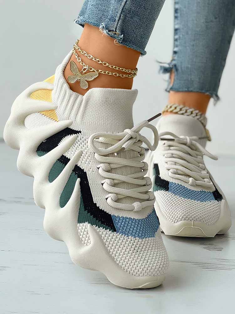 Zapatillas deportivas transpirables de punto con cordones