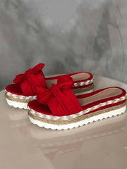 Sandalen mit Plateau-Wedges und Schleife