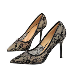 Elegante Pumps mit spitzer Spitze und Blumenspitze und Stilettoabsatz - Schwarz